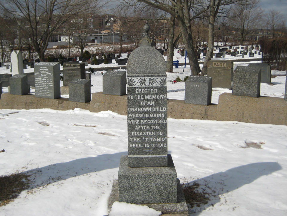 This Feb. 29, 2012 photo shows a child's headstone at the Fairview Lawn Cemetery in Halifax, Nova Scotia, Canada. In 2002, Canadian researchers identified him as a 13-month-old Finnish boy, Eino Viljami Panula. But in 2007, DNA testing determined that he was 19-month-old English boy, Sidney Leslie Goodwin, who died with his entire family, including five siblings, as they were sailing to a new life in America. One hundred years ago, ships from this old port city on the Atlantic set out to recover the Titanic's dead. They brought back more than 330 bodies; 150 are buried in three Halifax cemeteries. (AP Photo/Robert Gillies)