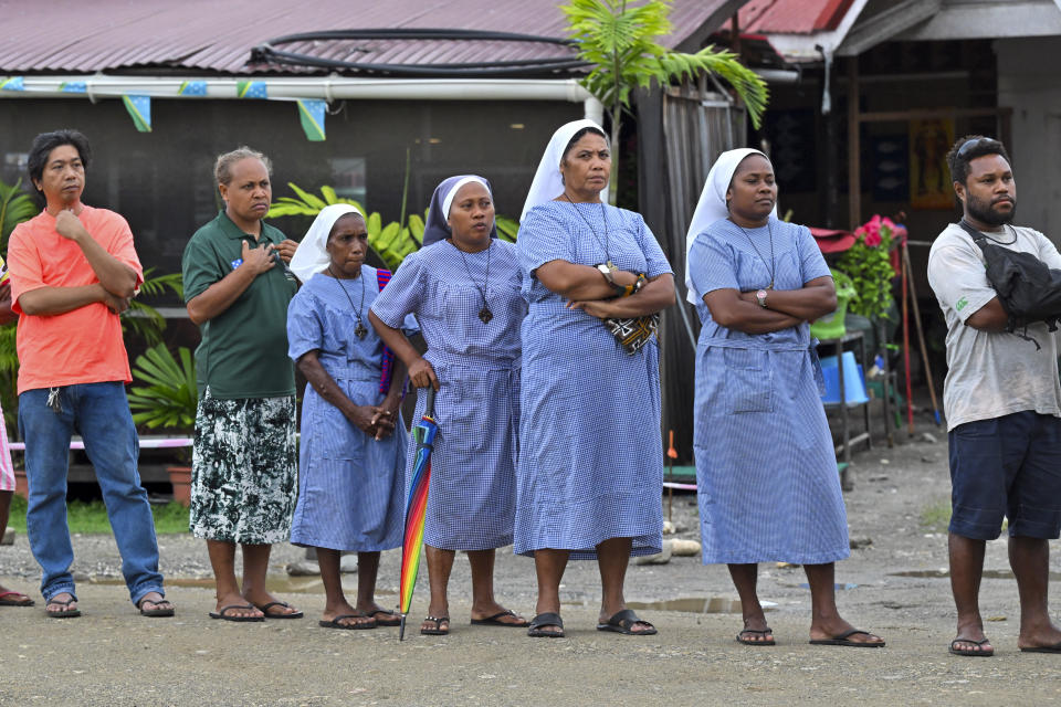 Nuns queue at a polling station during the Solomon Islands elections in the capital Honiara, Wednesday, April 17, 2024. Voting began across the Solomon Islands on Wednesday in the South Pacific nation's first general election since the government switched diplomatic allegiances from Taiwan to Beijing and struck a secret security pact that has raised fears of the Chinese navy gaining a foothold in the region. (Mick Tsikas/AAP Image via AP)