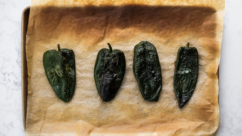roasted poblano peppers on sheet pan
