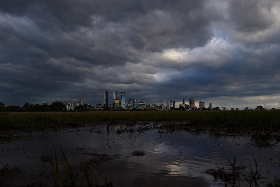 Storm clouds are seen over Melbourne's CBD from Royal Park in Melbourne, Thursday, August 27, 2020. 