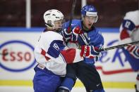 Norway's Martin Ronnild (L) vies with Finland's Teuvo Teravainen during their preliminary round match at the International Ice Hockey Federation (IIHF) World Junior Hockey Championships in Malmo December 27, 2013. REUTERS/Andreas Hillergren/TT News Agency (SWEDEN - Tags: SPORT ICE HOCKEY) ATTENTION EDITORS � THIS IMAGE WAS PROVIDED BY A THIRD PARTY. FOR EDITORIAL USE ONLY. NOT FOR SALE FOR MARKETING OR ADVERTISING CAMPAIGNS. SWEDEN OUT. NO COMMERCIAL OR EDITORIAL SALES IN SWEDEN. THIS PICTURE IS DISTRIBUTED EXACTLY AS RECEIVED BY REUTERS, AS A SERVICE TO CLIENTS