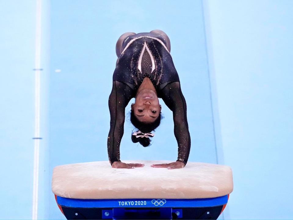 Simone Biles on vault.