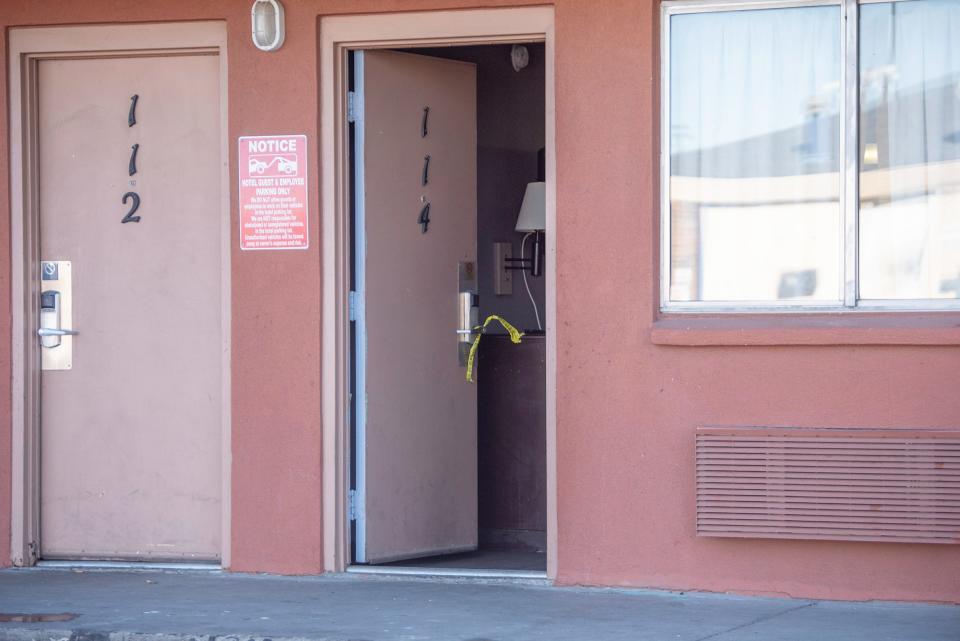 Police tape hangs from a door during a multi-agency operation targeted at addressing criminal activity as well as suspected code violations and safety issues took place at Pueblo's Rodeway Inn on Thursday, February 1, 2024.