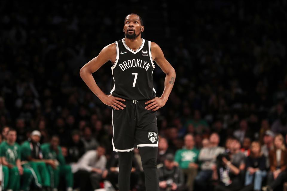 Brooklyn Nets forward Kevin Durant (7) looks up at the scoreboard in the third quarter against the Boston Celtics at Barclays Center.