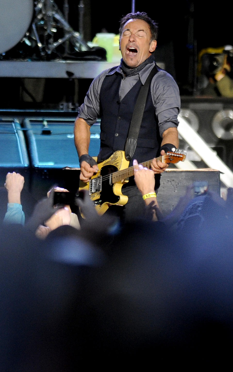 Bruce Springsteen performs with the E Street Band during the 2014 NCAA March Madness Music Festival - Capital One JamFest, Sunday, April 6, 2014, in Dallas. (Photo by Matt Strasen/Invision/AP)