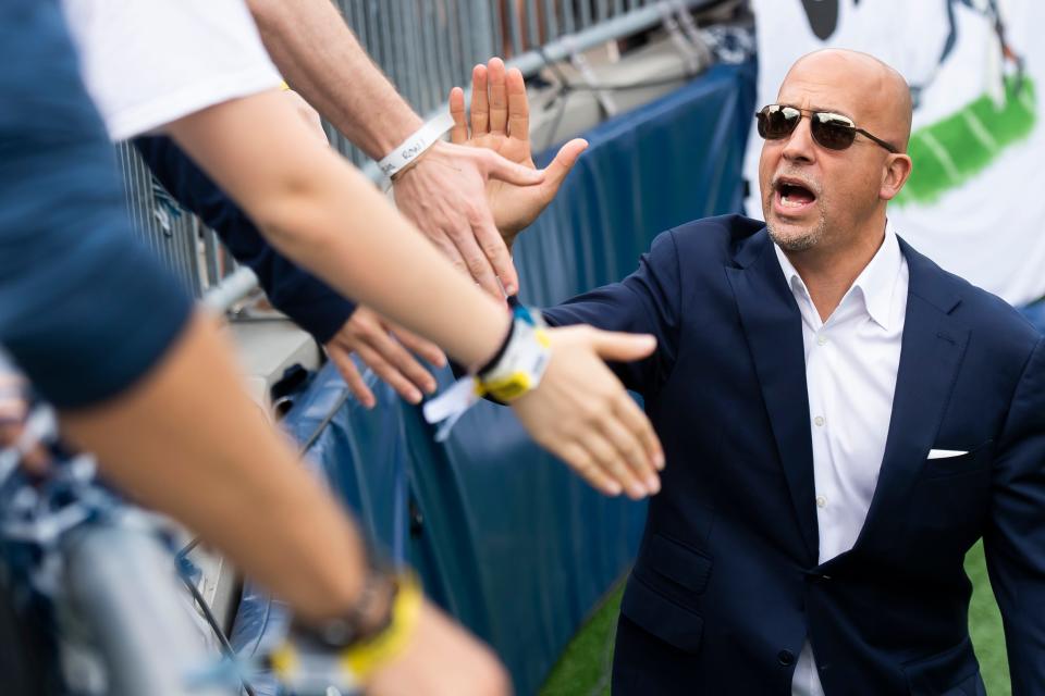Penn State head football coach James Franklin greets members of the student section in Beaver Stadium before an NCAA football game against Indiana Saturday, Oct. 28, 2023, in State College, Pa.