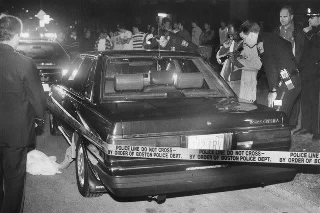 <p>Tom Herde/The Boston Globe via Getty Images</p> Police investigate Charles Stuart's car at the shooting scene on St. Alphonsus Street in Mission Hill on October 23, 1989.