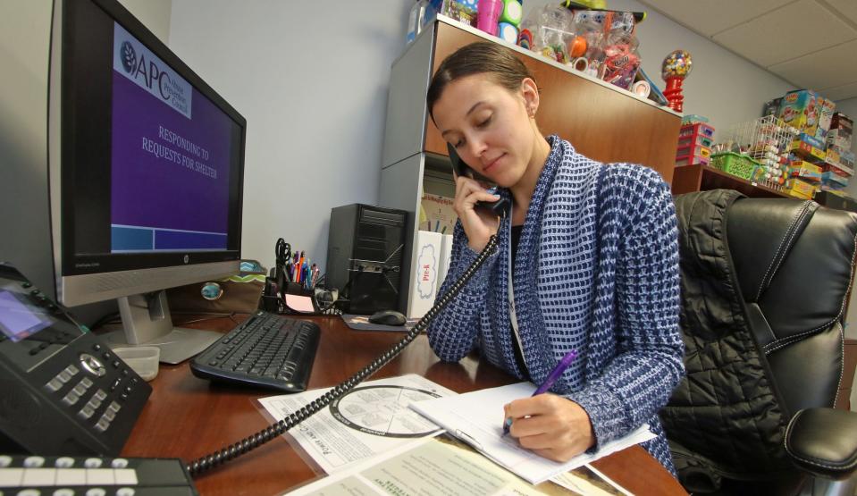 Children’s Program coordinator Madison Royster works in her office at the Abuse Prevention Council shelter in Shelby Friday afternoon, March 17, 2023.