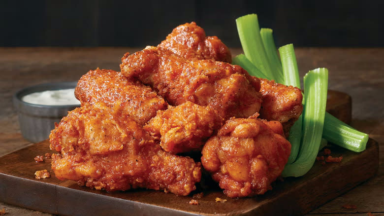 Plate of chicken wings and celery