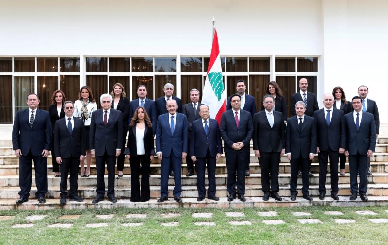 Members of the new Lebanese government pose for a picture at the presidential palace in Baabda