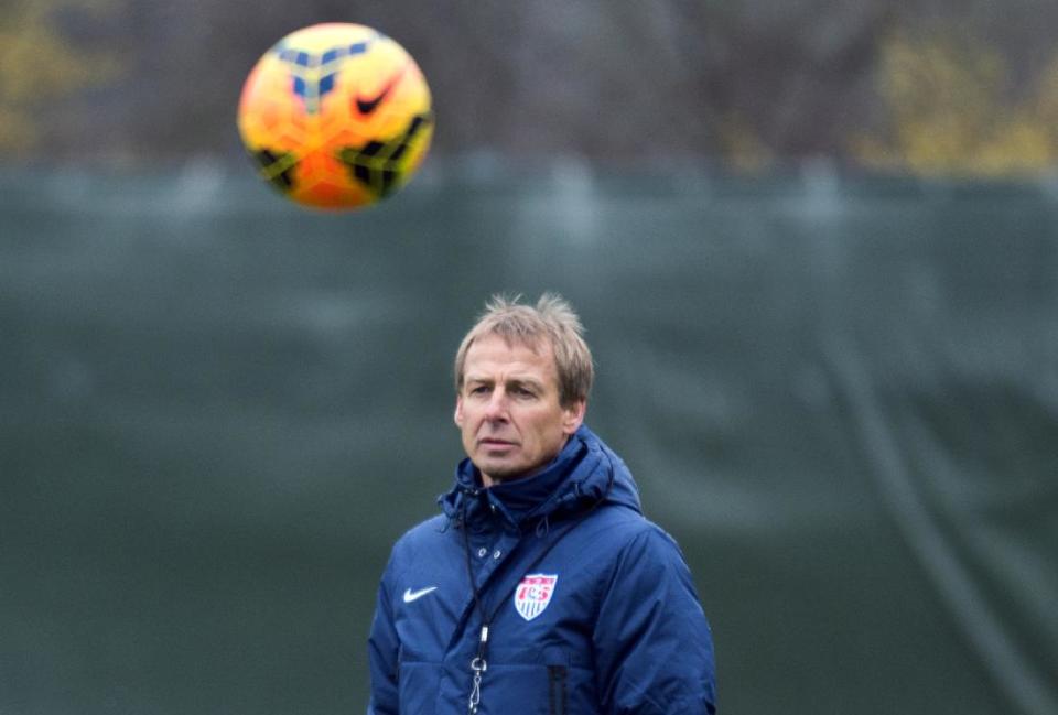 Juergen Klinsmann, coach of the US American national soccer team, leads a training session of his team in Frankfurt Germany, Monday March 3, 2014. The USA will face Ukraine on Cyprus on Wednesday. (AP Photo/dpa,Boris Roessler)
