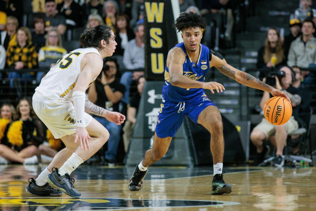 Tulsa Golden Hurricane guard PJ Haggerty, right, was reportedly one of the recruiting targets of Providence coach Kim English, but he committed to Memphis.