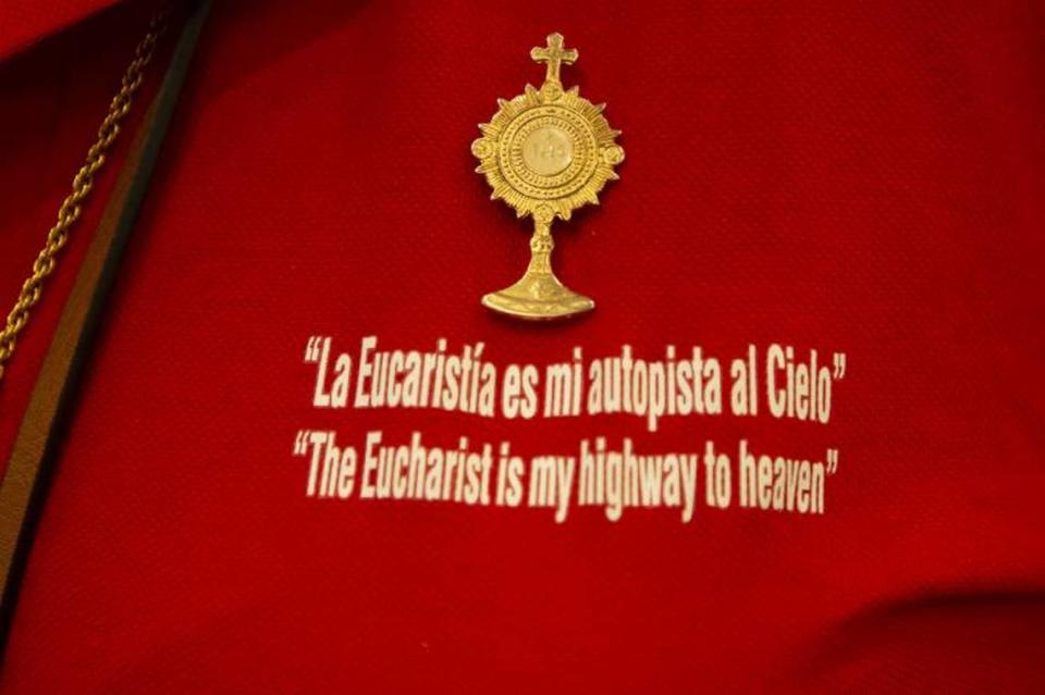 Polo shirts bearing a quote from the late Carlo Acutis, a young adult who is slated to become the first millennial saint in the Catholic Church, were among the items for sale at the IV International Eucharistic-Marian Congress in Miami in 2022.