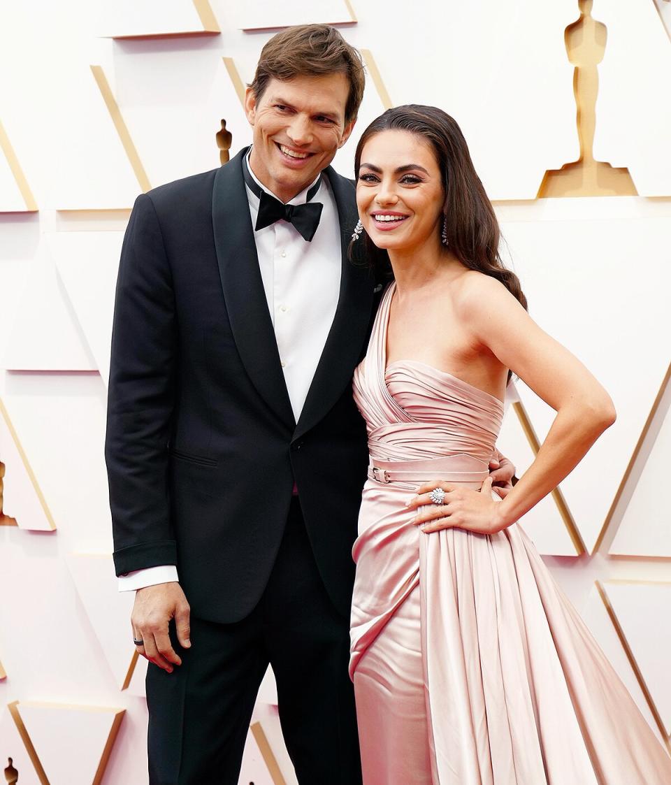 Ashton Kutcher and Mila Kunis attend the 94th Annual Academy Awards