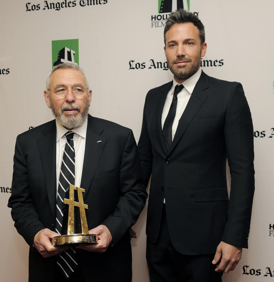 Ben Affleck, right, a cast member and director of the film "Argo," poses with former C.I.A. agent Tony Mendez, whom he portrays in the film, backstage at the 16th Annual Hollywood Film Awards Gala on Monday, Oct. 22, 2012, in Beverly Hills, Calif. (Photo by Chris Pizzello/Invision/AP)