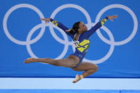 Rebeca Andrade, of Brazil, performs on the floor during the artistic gymnastics women's all-around final at the 2020 Summer Olympics, Thursday, July 29, 2021, in Tokyo. (AP Photo/Ashley Landis)