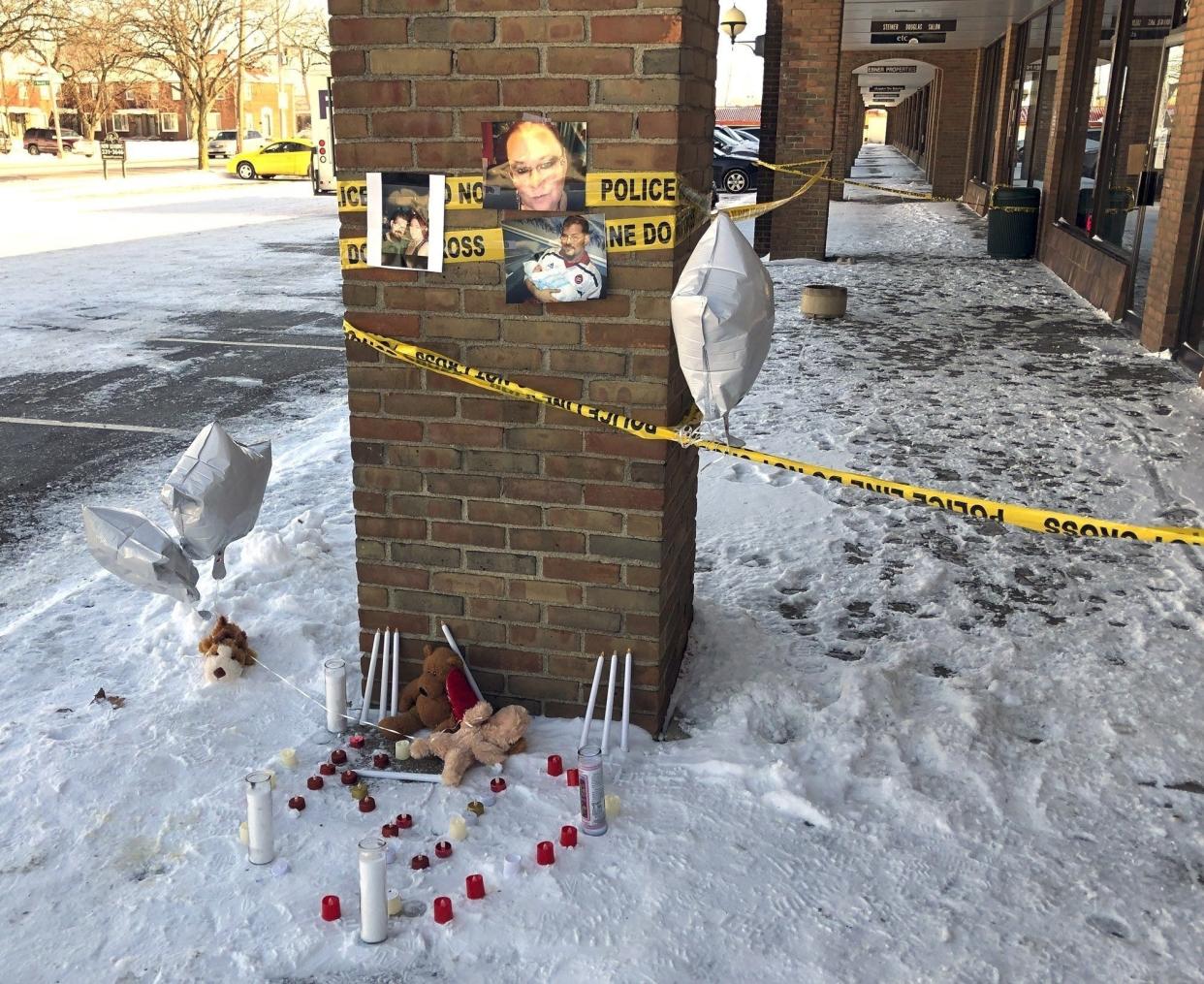 Joseph and Karen Arrington had been married more than 10 years and were working at Players Paradise when police said they were killed during an armed robbery in January 2019. Hours after news of their deaths, teddy bears, candles and photos were placed in the snow outside. [Bethany Bruner /Dispatch]
(Photo: The Columbus Dispatch)