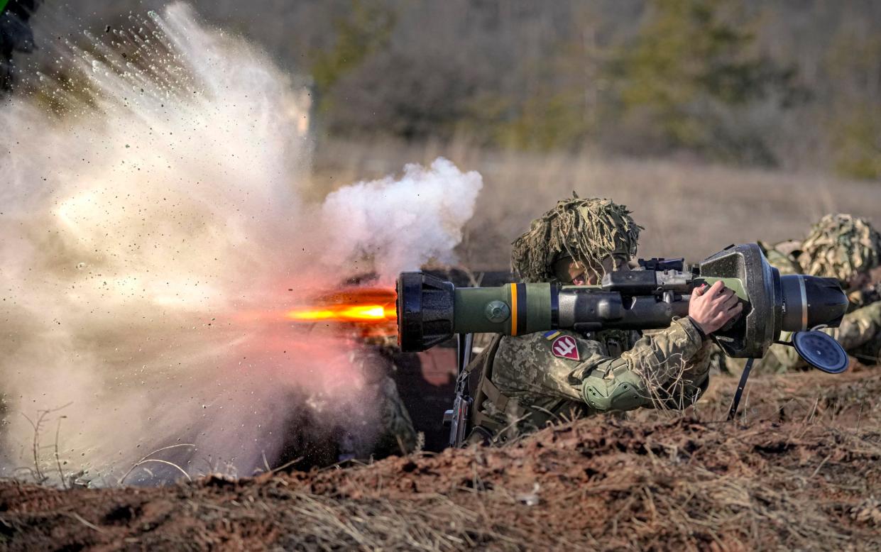 A Ukrainian serviceman fires an NLAW anti-tank weapon - Vadim Ghirda