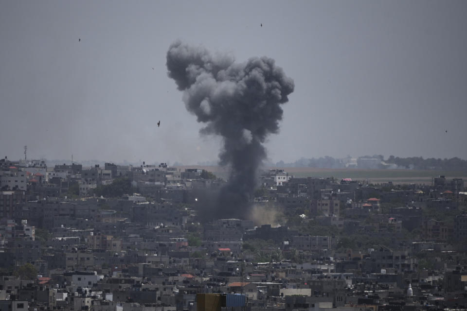 Smoke rises from an explosion caused by an Israeli airstrike in the Gaza Strip, Saturday, May 13, 2023. (AP Photo/Hatem Moussa)