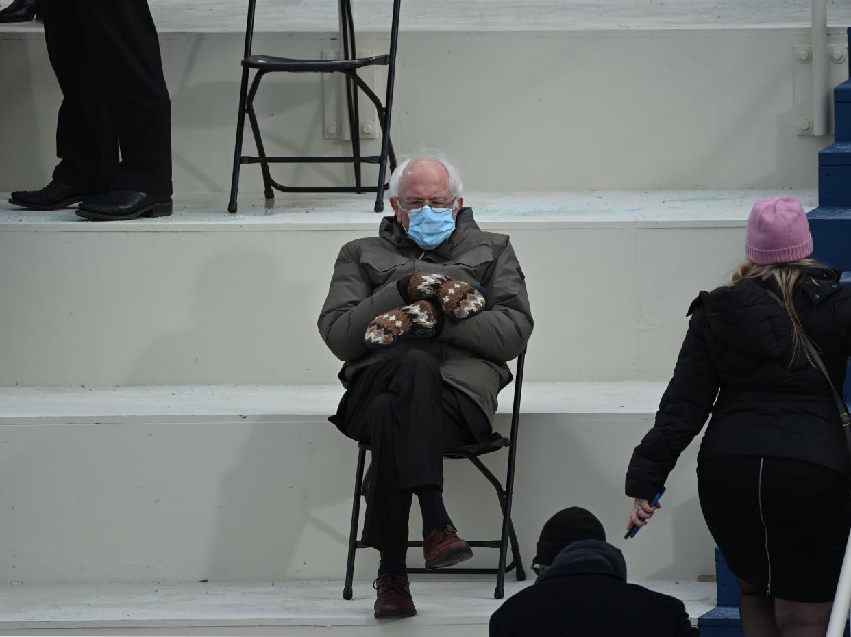 Former presidential candidate, Senator Bernie Sanders (D-Vermont) sits in the bleachers on Capitol Hill before Joe Biden is sworn in as the 46th US President on January 20, 2021, at the US Capitol in Washington, DC. (Photo by Brendan SMIALOWSKI / AFP) (Photo by BRENDAN SMIALOWSKI/AFP via Getty Images)