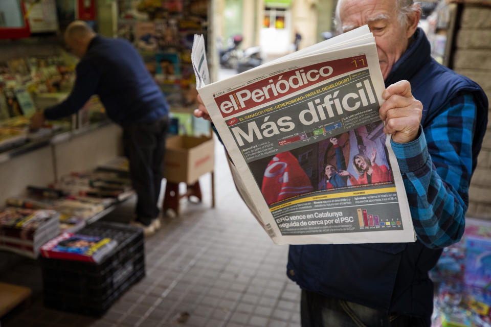 A man reads a newspaper at a newsstand in Barcelona, Spain, Monday, Nov. 11, 2019. Spain looked set Monday to face months more of political uncertainty after the country's fourth elections in as many years further complicated an already messy political situation, giving no party a clear mandate to govern while the far right became a major parliamentary player for the first time in decades. The newspaper headline reads in Spanish: "More Dificult". (AP Photo/Emilio Morenatti)