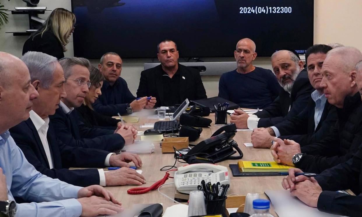 <span>Israel's war cabinet, chaired by Benjamin Netanyahu, meets in Tel Aviv to discuss the drone attack launched by Iran.</span><span>Photograph: Anadolu/Getty Images</span>