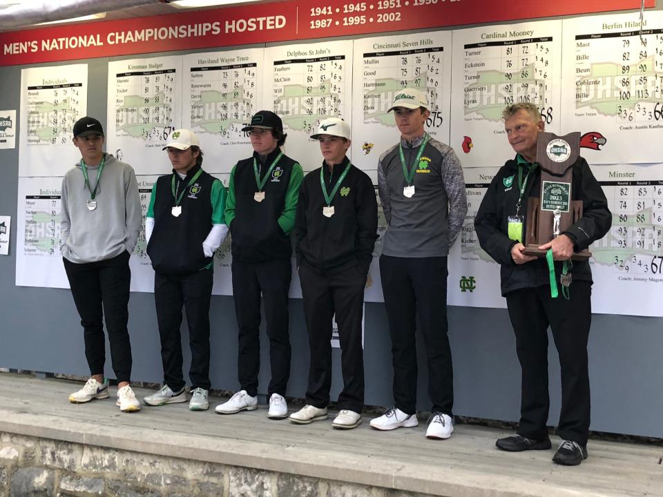 Newark Catholic poses with the Division III state runner-up trophy Oct. 14 at Ohio State's Scarlet Course. Pictured, from left, are Max Vanoy, Brian Luft, Brogan Sullivan, Bobby Kieber, Nathan Riggleman and coach Phil West.