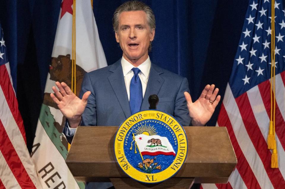 Gov. Gavin Newsom announces the May budget revision in Sacramento on Friday, May 12, 2023. Newsom must negotiate with the Legislative Black Caucus over reparations while dealing with a $68 billion budget gap.