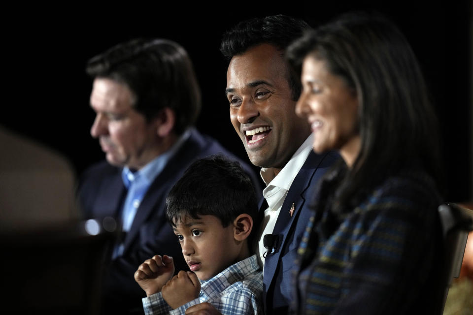 Republican presidential candidate businessman Vivek Ramaswamy holds his three-year old son Karthik as he speaks during the Family Leader's Thanksgiving Family Forum, Friday, Nov. 17, 2023, in Des Moines, Iowa. / Credit: Charlie Neibergall / AP