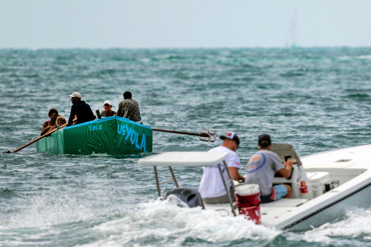 In this photo from August, 2022, Cuban migrants row toward Stock Island, near Key West, Fla.