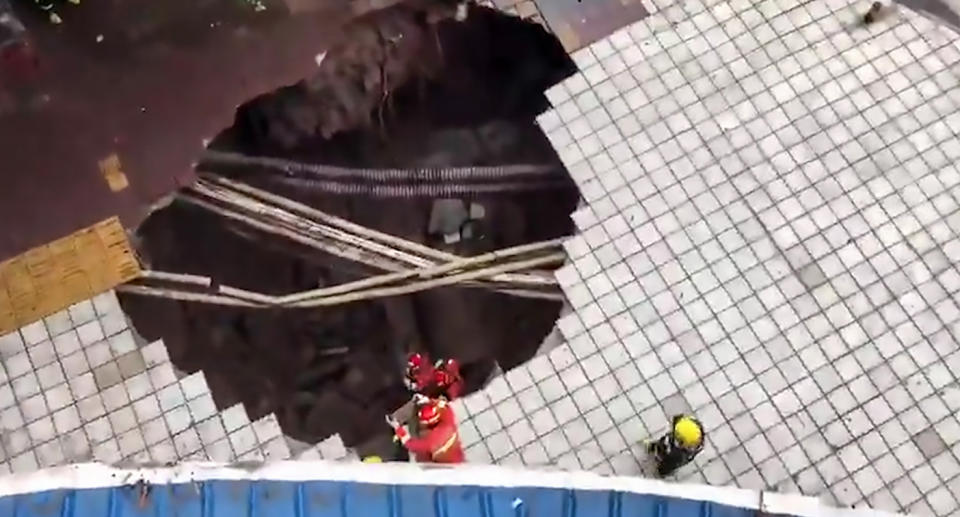 Five people fell in when the sinkhole opened up in Dazhou city, China.