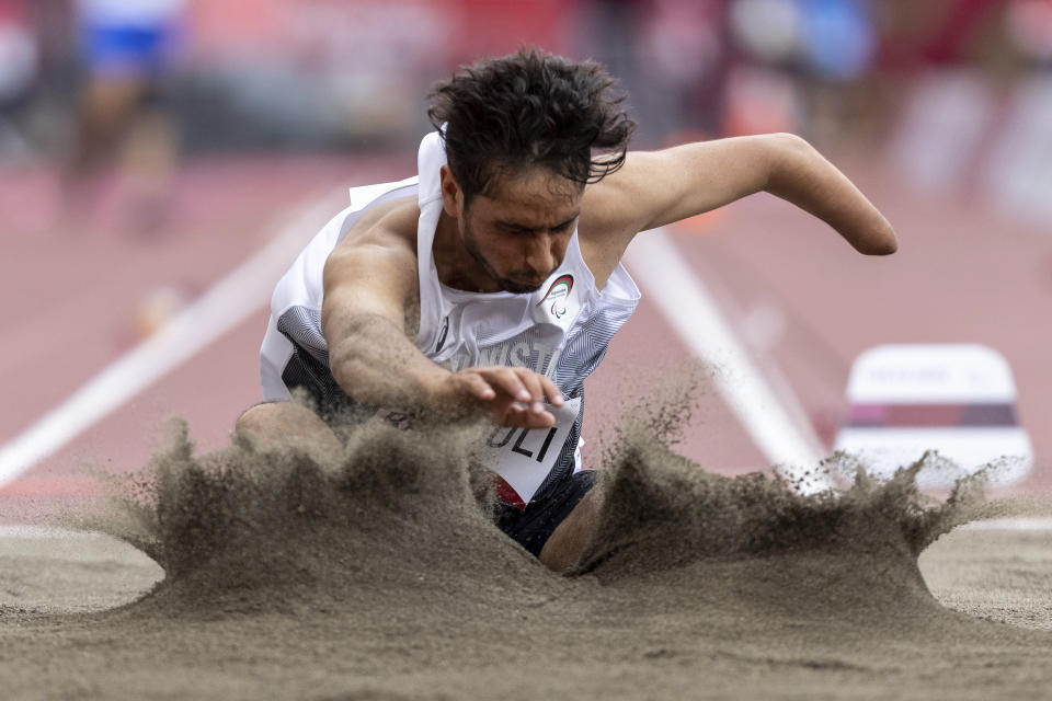Hossain Rasouli of Afghanistan competes in the Men's Long Jump T47 Athletics final at the Tokyo 2020 Paralympic Games in Tokyo Tuesday, Aug. 31, 2021. (Simon Bruty for OIS via AP)