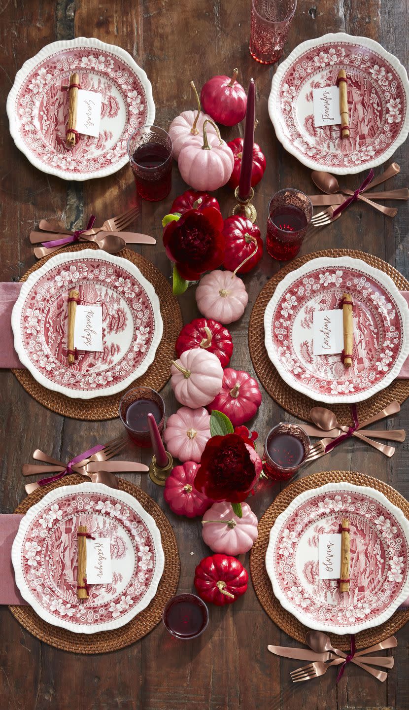 <p>Paint small white pumpkins in differing shades of red and pink to create a lovely ombre effect down the center of the table. Add single maroon flowers in bud vases here and there for a light floral touch.</p><p><a class="link " href="https://www.amazon.com/GOTIDEAL-Acrylic-Pigments-Painters-Supplies/dp/B082HK57QB/ref=sr_1_21?tag=syn-yahoo-20&ascsubtag=%5Bartid%7C10050.g.2063%5Bsrc%7Cyahoo-us" rel="nofollow noopener" target="_blank" data-ylk="slk:SHOP PAINT;elm:context_link;itc:0;sec:content-canvas">SHOP PAINT</a></p>