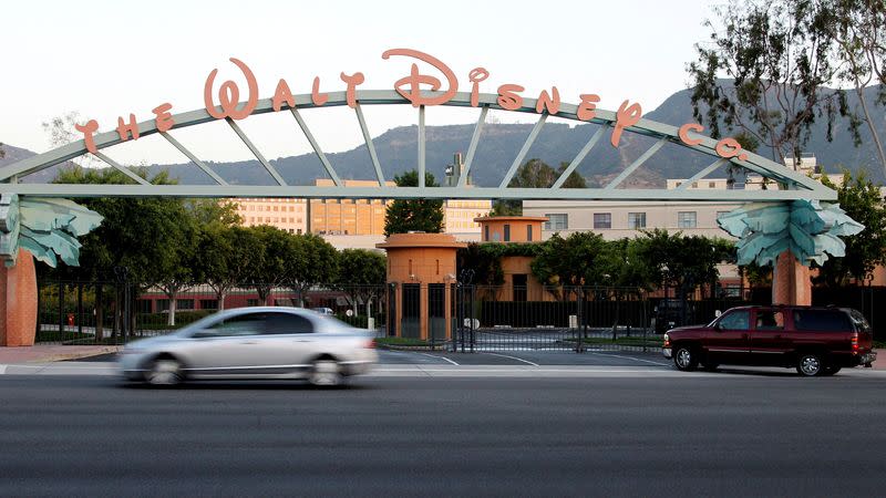 FILE PHOTO: The signage at the main gate of The Walt Disney Co. is pictured in Burbank