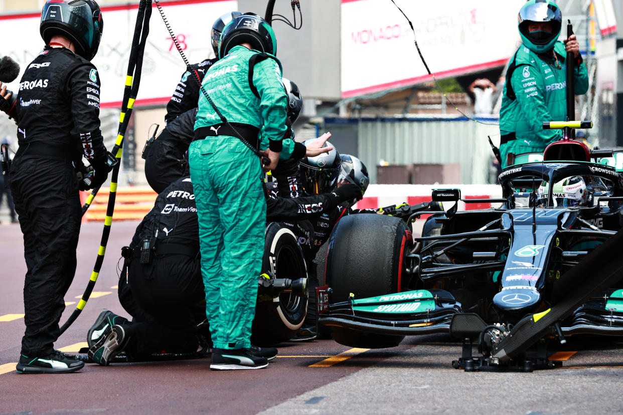 MONTE-CARLO, MONACO - MAY 23: Valtteri Bottas of Finland driving the (77) Mercedes AMG Petronas F1 Team Mercedes W12 makes a pitstop but his front right wheel is stuck on his car leading to his retirement from the race during the F1 Grand Prix of Monaco at Circuit de Monaco on May 23, 2021 in Monte-Carlo, Monaco. (Photo by Mark Thompson/Getty Images)