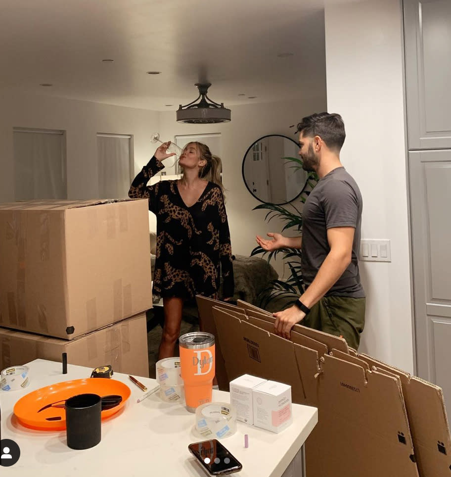 <p>These engaged <em>Bachelor in Paradise</em> alums are moving into their first house! And packing isn't their strong suit.</p> <p>"I’m freaking out and so so soooo excited! 🤯," <a href="https://www.instagram.com/p/CG9K1OdjS0_/" rel="nofollow noopener" target="_blank" data-ylk="slk:Godwin wrote;elm:context_link;itc:0;sec:content-canvas" class="link ">Godwin wrote</a>, before joking: "Packing is going well and I’m lucky that we are such a balanced team lol." </p>