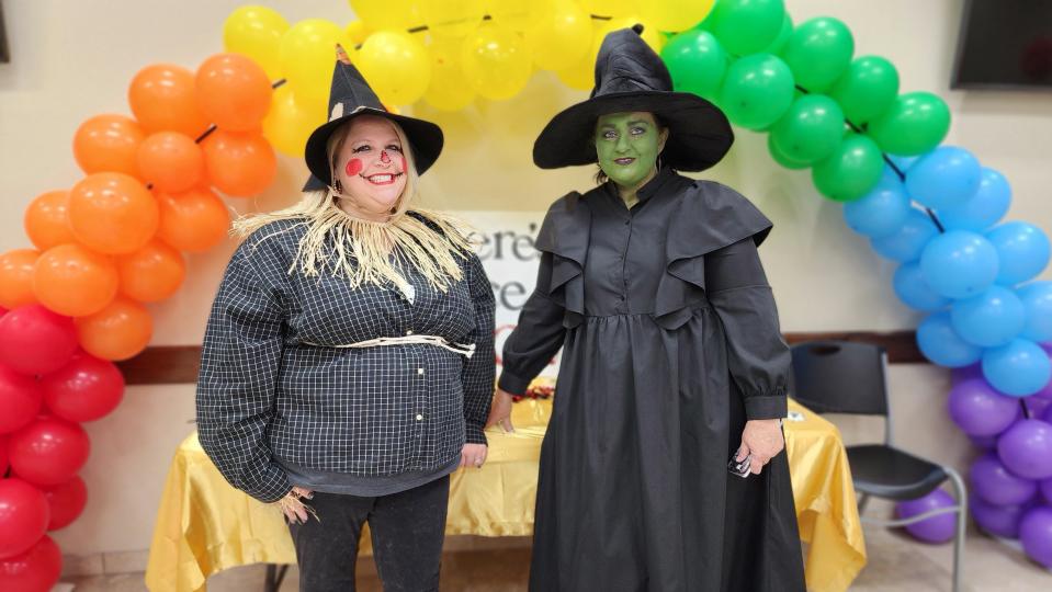 Two members of St. Francis Ministries are dressed as characters from "The Wizard of Oz" at the Nov. 17 National Adoption Day event at the Randall County Courthouse in Canyon.