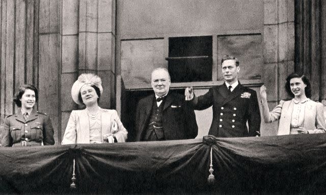 Culture Club/Getty Images Princess Elizabeth, Queen Elizabeth, Prime Minister Winston Churchill, King George VI and Princess Margaret balcony of Buckingham Palace during VE Day celebrations on May 8, 1945.