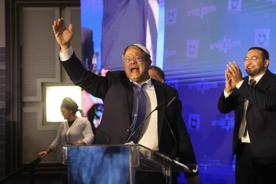 Israeli far-right lawmaker and the head of "Jewish Power" party, Itamar Ben-Gvir, gestures after first exit poll results for the Israeli Parliamentary election at his party's headquarters in Jerusalem, Wednesday, Nov. 2, 2022. (AP Photo/Oren Ziv)