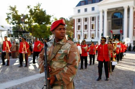 A member of the South African Defence Force stands guard ahead of President Jacob Zuma's State of the Nation Address (SONA) to a joint sitting of the National Assembly and the National Council of Provinces in Cape Town, South Africa February 9, 2017. REUTERS/Nic Bothma/Pool