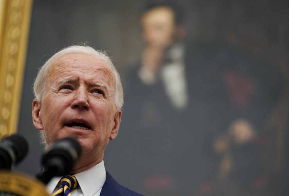 President Joe Biden delivers remarks on the economy in the State Dining Room of the White House, Friday, Jan. 22, 2021, in Washington. (AP Photo/Evan Vucci)