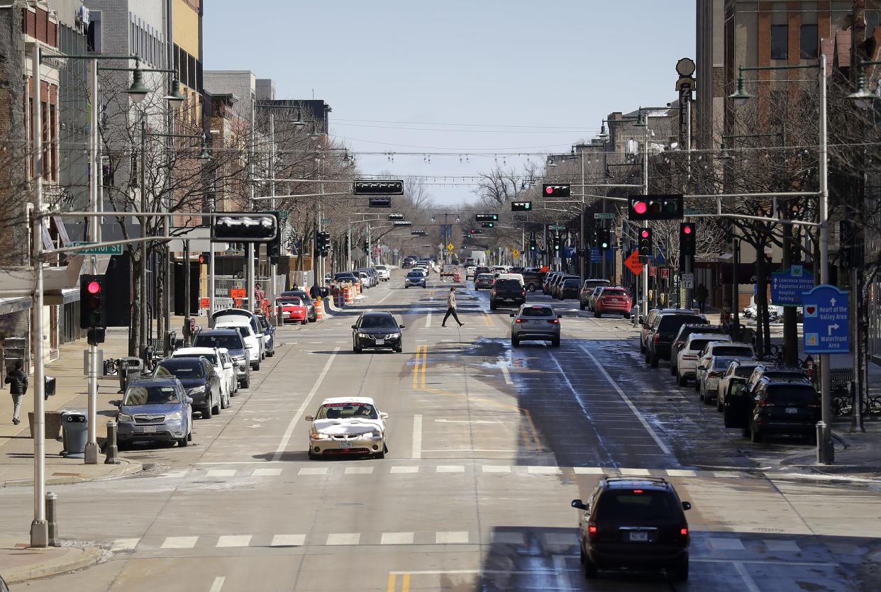 Appleton's College Avenue, shown here looking east, has one lane of travel in each direction and a center left-turn lane at each intersection.