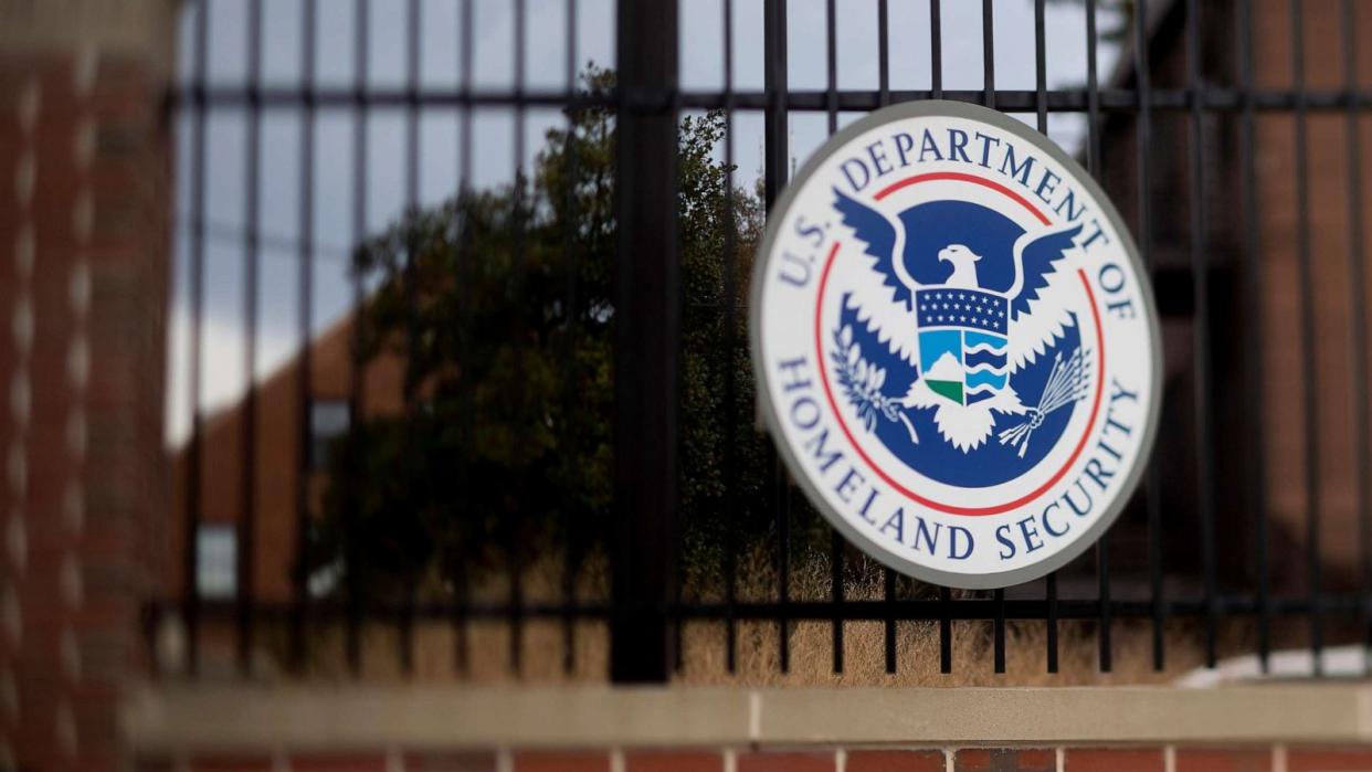 PHOTO: The U.S. Department of Homeland Security (DHS) seal hangs on a fence at the agency's headquarters in this photo taken with a tilt-shift lens in Washington, D.C., Dec. 11, 2014. (Andrew Harrer/Bloomberg via Getty Images, FILE)