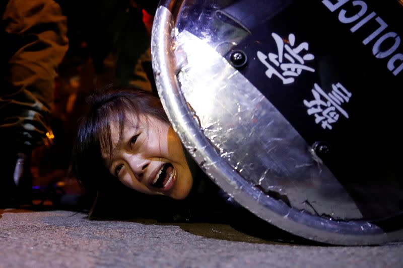 Pictures of the Year: Hong Kong protest tide turns into sea of flames