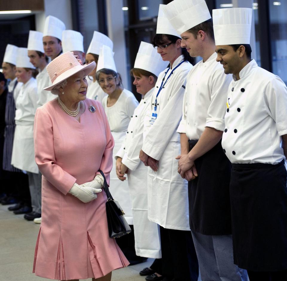 The Queen honors the head chef with a toast.