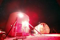 �A view of the night sky above the Mars Desert Research Station (MDRS) is seen outside Hanksville in the Utah desert March 2, 2013. The MDRS aims to investigate the feasibility of a human exploration of Mars and uses the Utah desert's Mars-like terrain to simulate working conditions on the red planet. Scientists, students and enthusiasts work together developing field tactics and studying the terrain. All outdoor exploration is done wearing simulated spacesuits and carrying air supply packs and crews live together in a small communication base with limited amounts of electricity, food, oxygen and water. Everything needed to survive must be produced, fixed and replaced on site. Picture taken March 2, 2013. REUTERS/Jim Urquhart