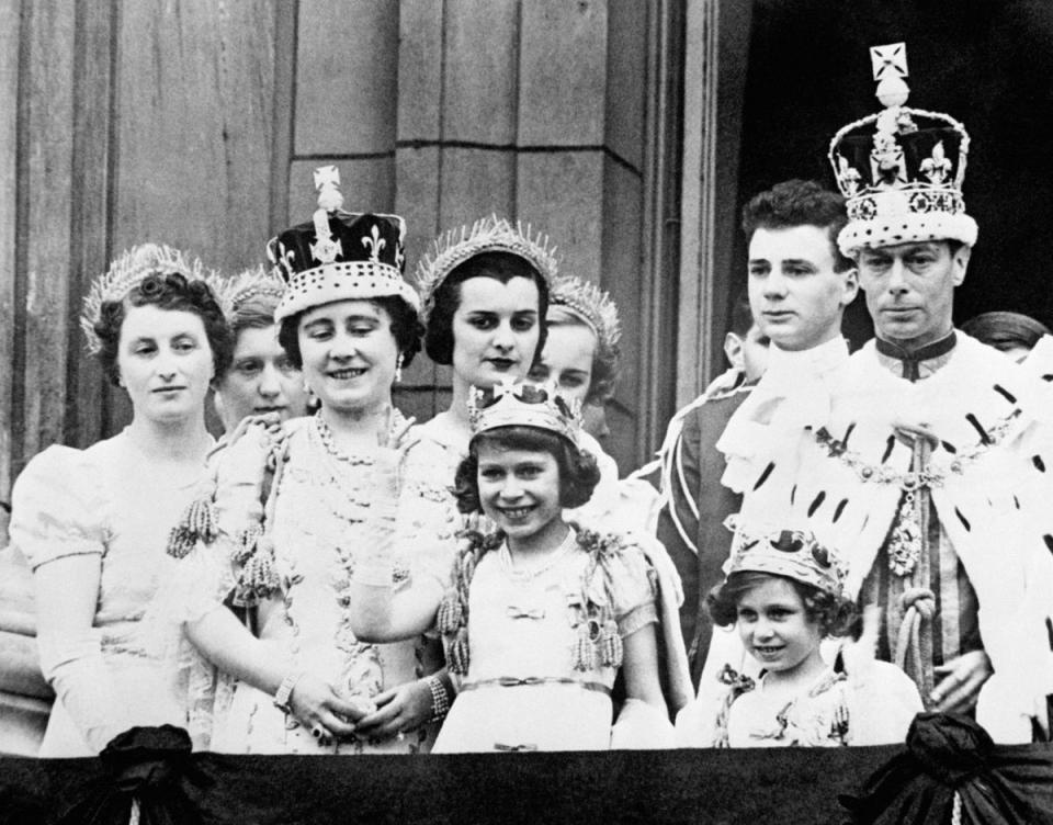 Queen Elizabeth (later the Queen Mother), Princess Elizabeth (the present Queen Elizabeth II), Princess Margaret and King George VI after his coronation, on the balcony of Buckingham Palace, London (PA)