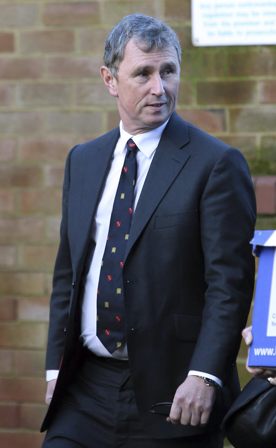 Former Deputy Speaker of Britain's House of Commons Nigel Evans, arrives at Preston Crown Court where he faces nine charges of alleged sexual offences against seven men, at court in Preston, England, Monday March 10, 2014. Evans denies all the alleged offences, which date from 2002 till 2013. (AP Photo / Peter Byrne, PA) UNITED KINGDOM OUT - NO SALES - NO ARCHIVES