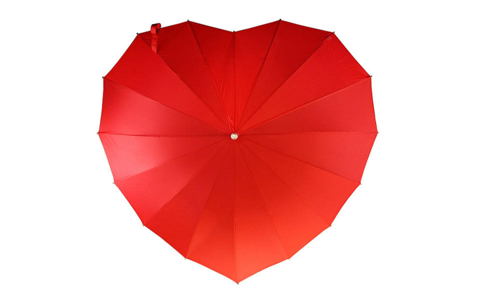 <p>Don't let a sudden storm ruin your Valentine's Day date. Come prepared for any adventure—rain or shine—with a windproof (and slightly on-the-nose), heart-shaped umbrella.</p> <p>To buy: <a rel="nofollow noopener" href="http://click.linksynergy.com/fs-bin/click?id=93xLBvPhAeE&subid=0&offerid=399947.1&type=10&tmpid=319&RD_PARM1=http%253A%252F%252Fwww.uncommongoods.com%252Fproduct%252Fcrimson-heart-umbrella&u1=TLTRVGGValentinesDayGiftsCH1Jan17" target="_blank" data-ylk="slk:uncommongoods.com;elm:context_link;itc:0;sec:content-canvas" class="link ">uncommongoods.com</a>, $32</p>