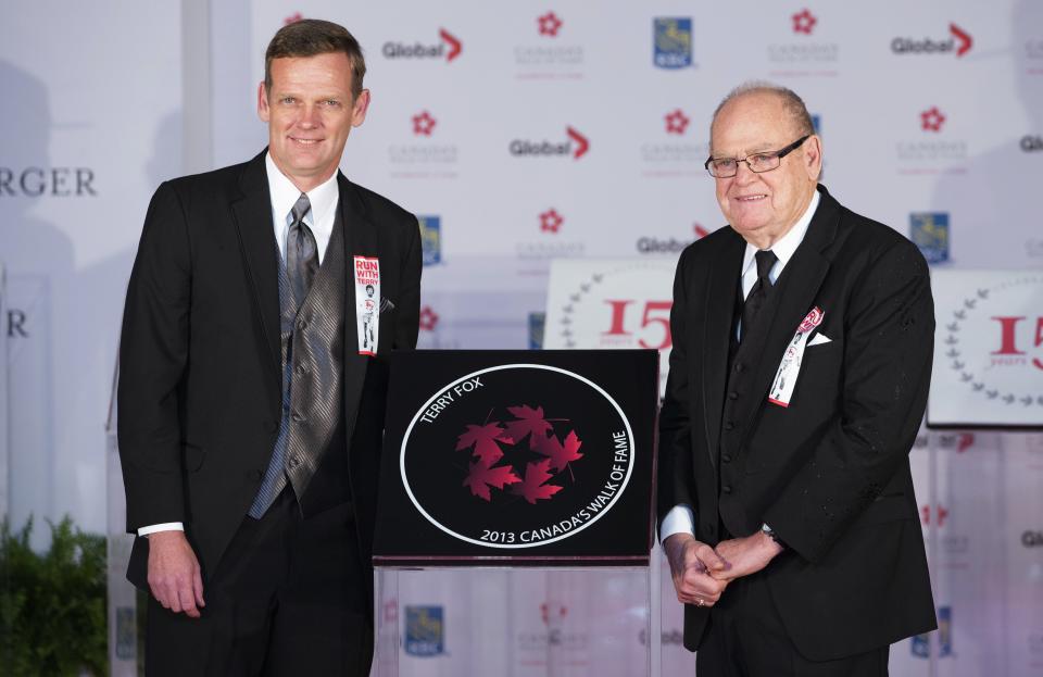 Late cancer research advocate Terry Fox has his star accepted posthumously by his brother and father during Canada's Walk of Fame induction ceremonies in Toronto